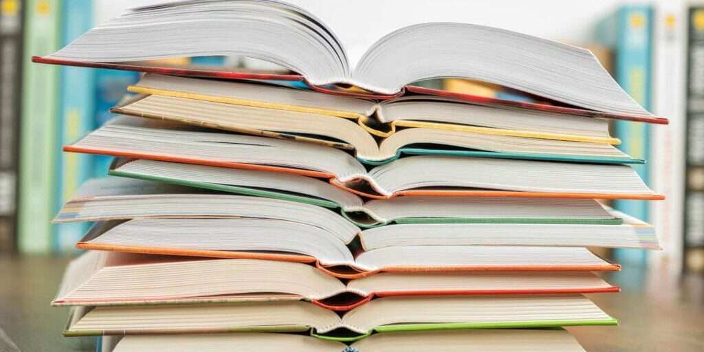 stack of open books